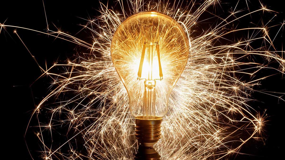 A lightbulb exploding into light